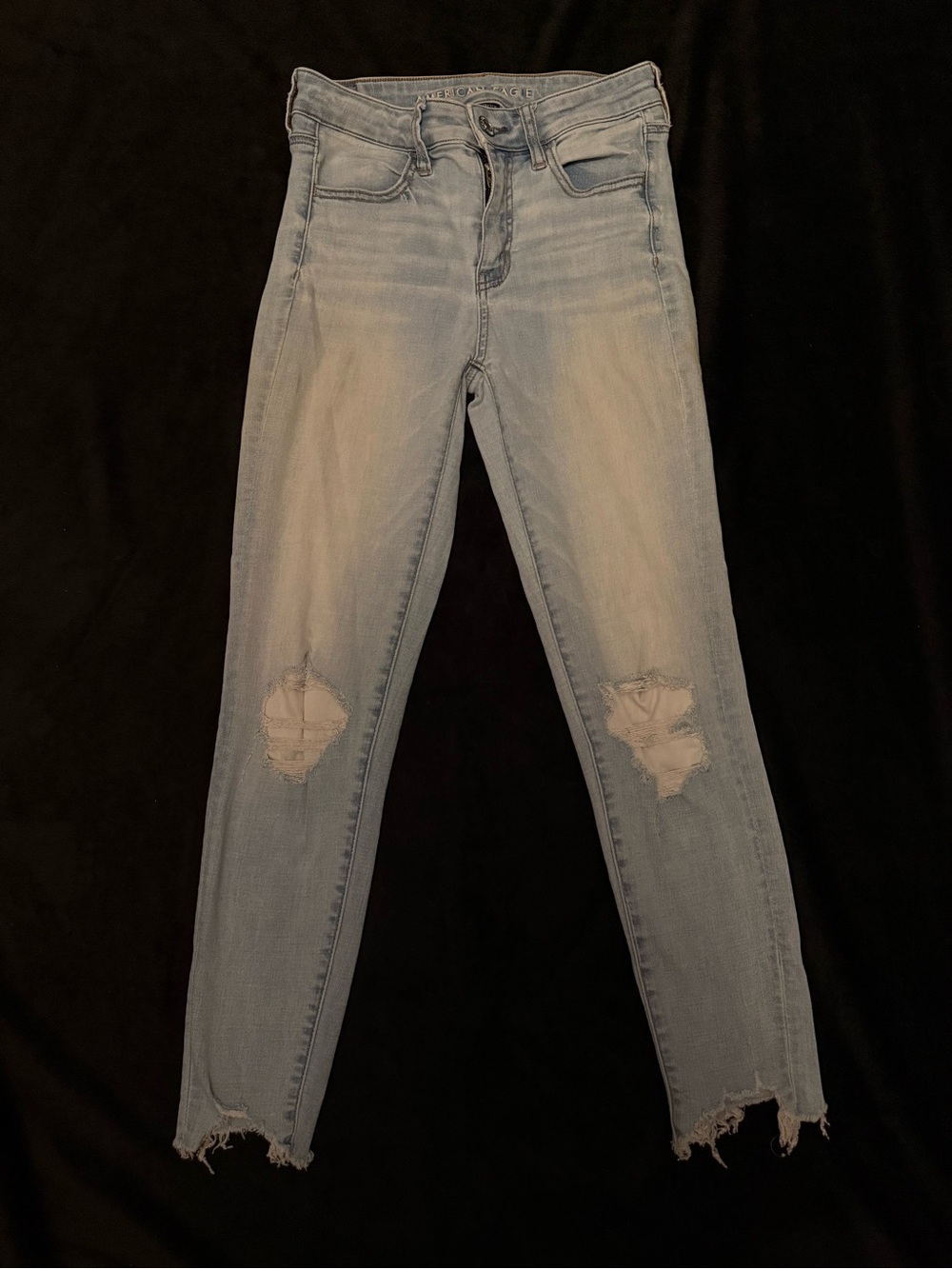 American Eagle Outfitters Light Blue Skinny Jeans with Distressed Knees